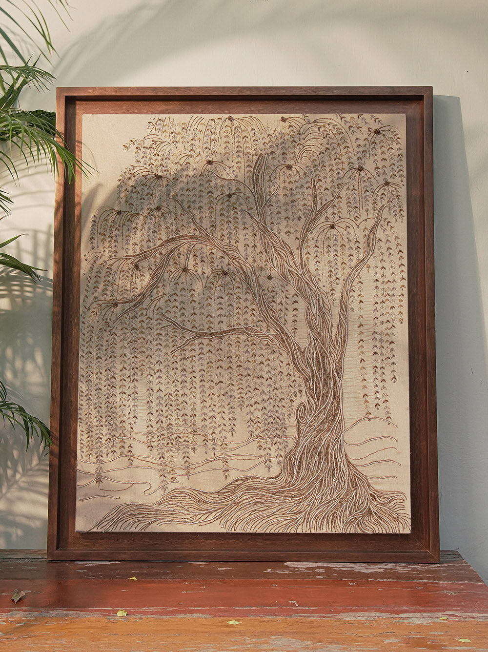 Embroidered textile surface study featuring willow tree motif developed for architectural wall application