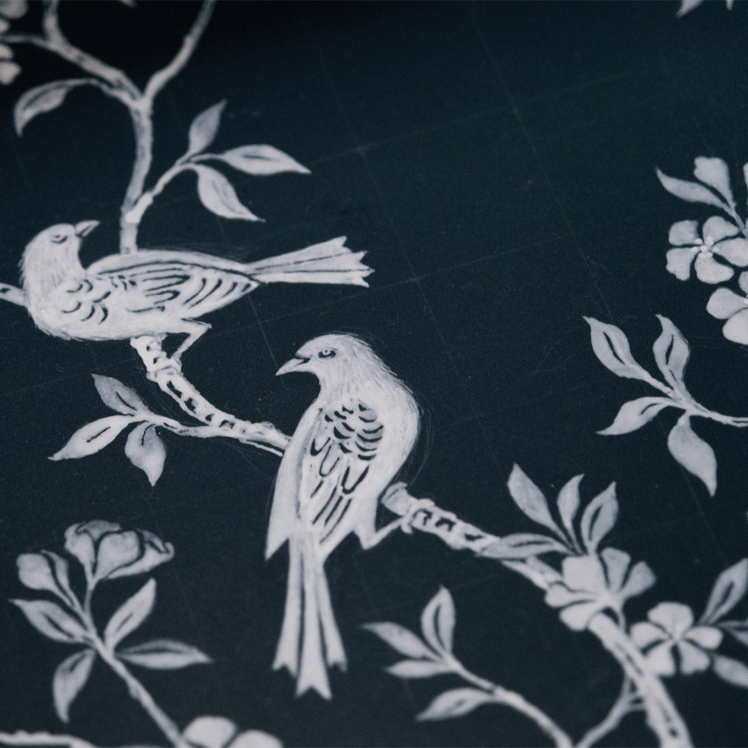 close-up of hand painted surface articulation on decorative tray object